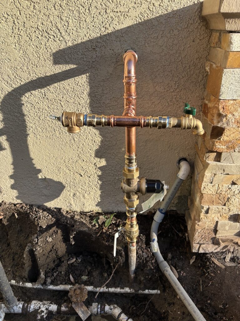 Copper main water piping with shutoff valve and hose connection