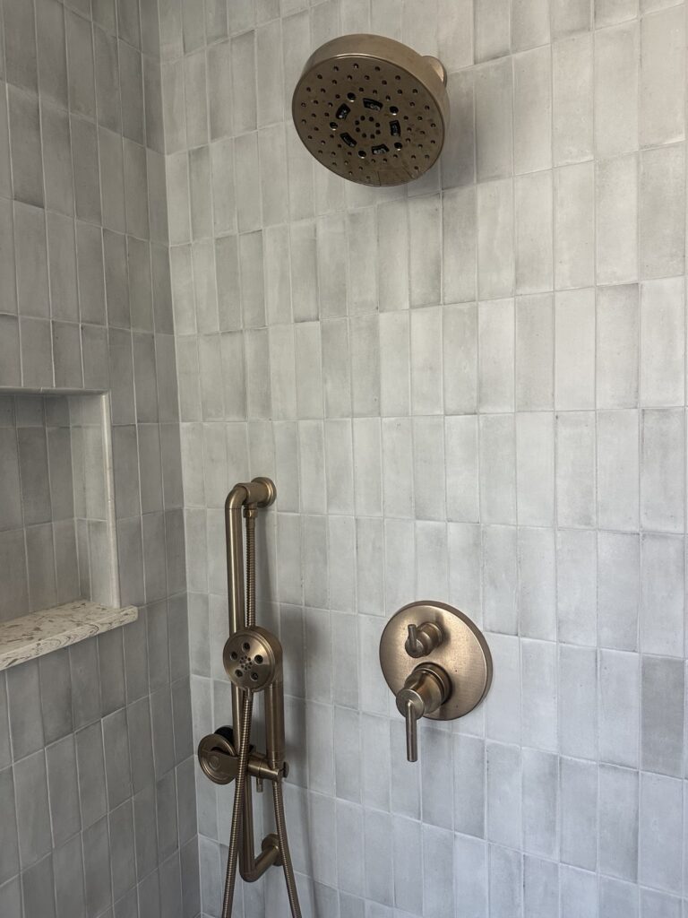 Completed walk-in shower fixture installation