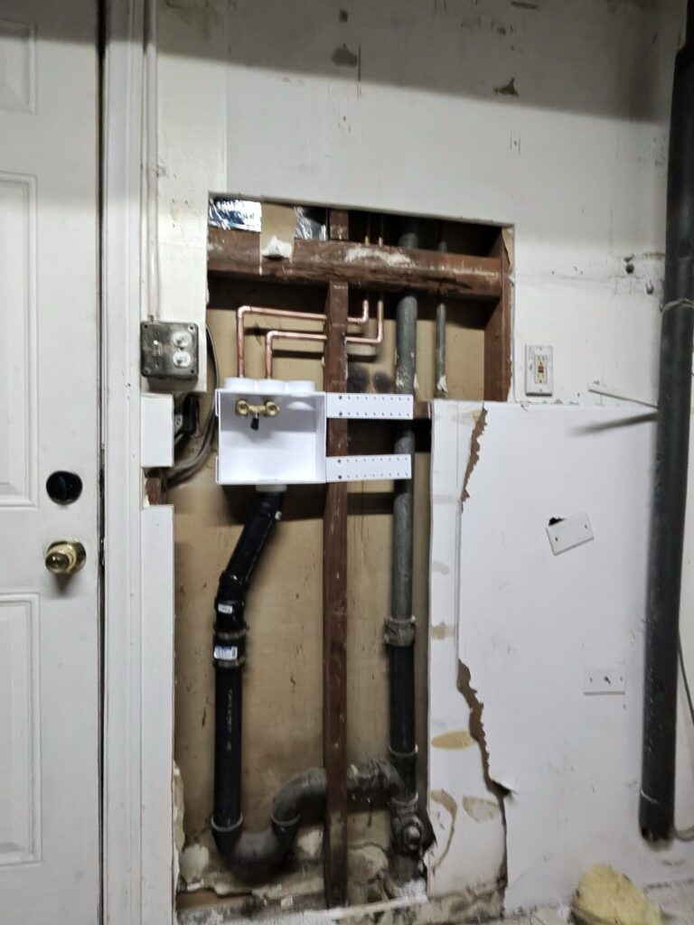 Wall opened for residential water line repair